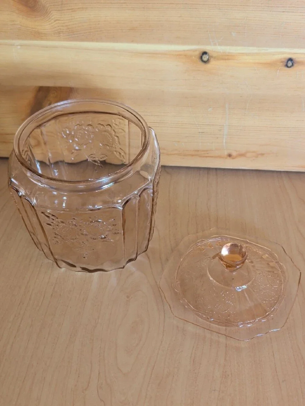 VTG. Pink Pressed Glass Cookie Jar with Lid and Floral Motif.
